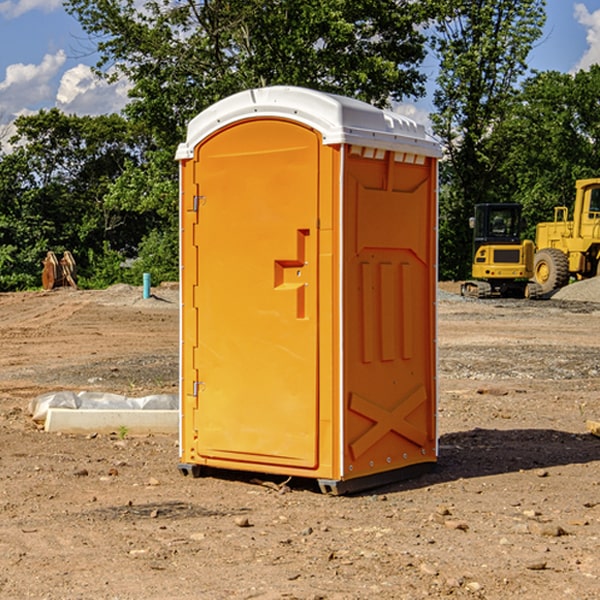 how often are the porta potties cleaned and serviced during a rental period in Green